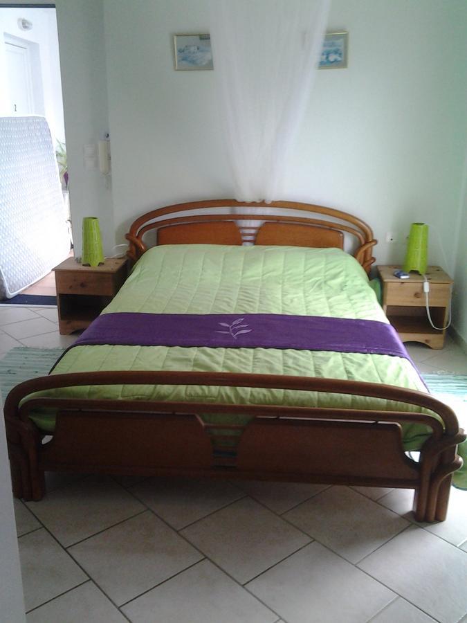 Robin'S Nest Afrata Apartment Luaran gambar